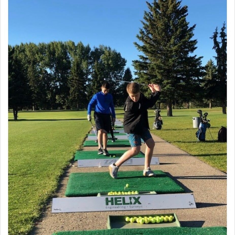 students on driving range