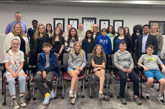 Group image of students and board members